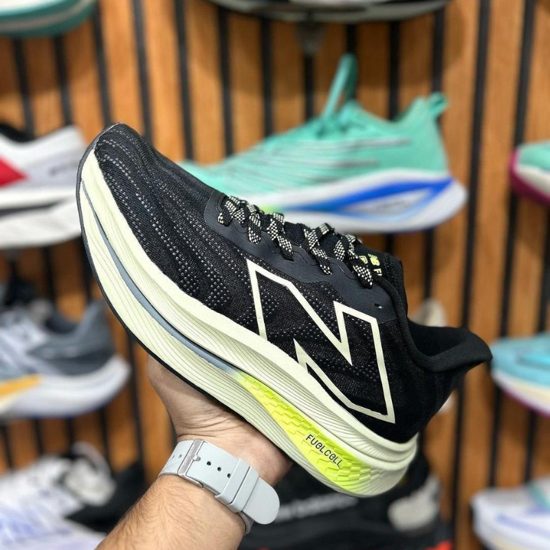 N_ew Bal_ance FuelCell Rebel v4 Black Volt Running Shoes