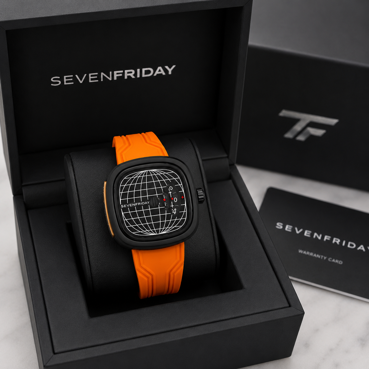 SE_VEN_FRI_DAY ME1/01 Men's Statement Watch – Black Globe Dial with Orange Silicone Strap