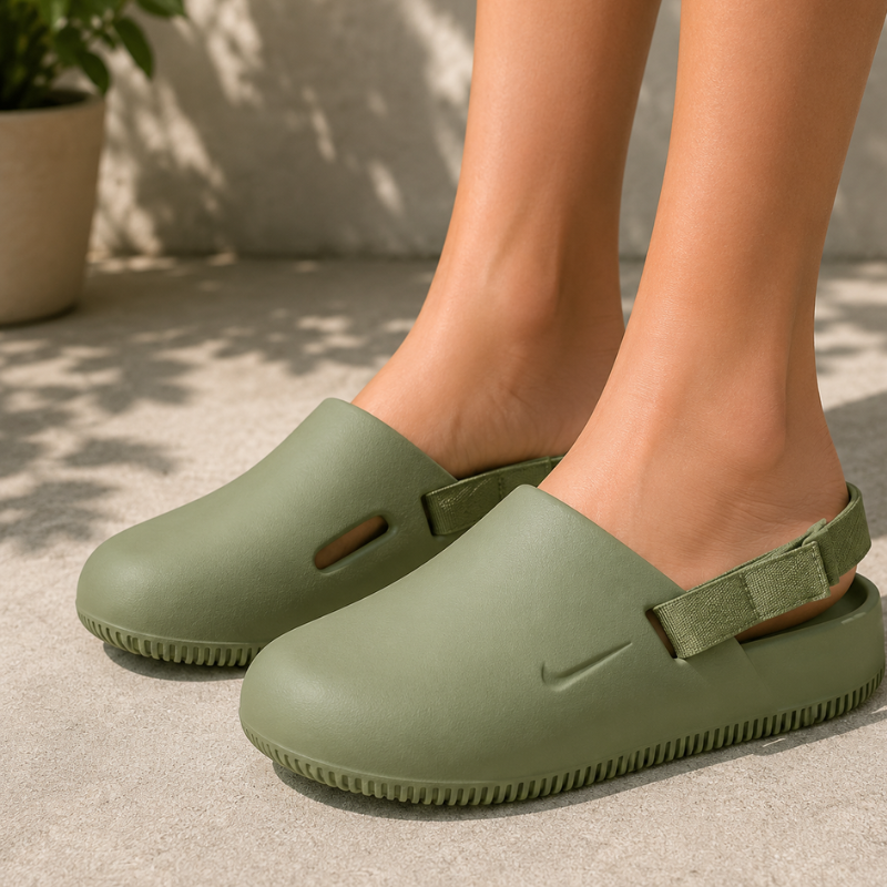Ni_ke Ca_lm Mule Comfort Slip-On Clogs