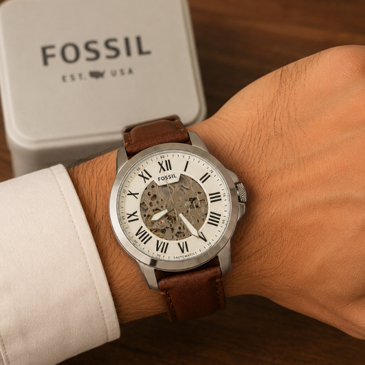 Fos_sil Men's Automatic Skeleton Dial Brown Leather Strap Analog Watch – Silver Case, Roman Numeral Display