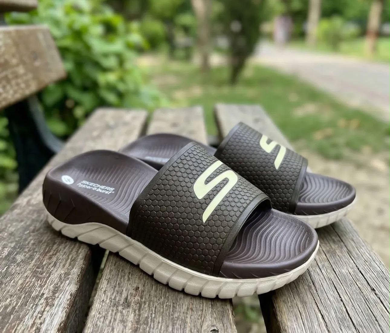Ske_chers Comfort Slides – Brown & White | In Stock