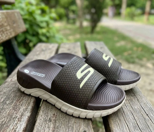 Ske_chers Comfort Slides – Brown & White | In Stock