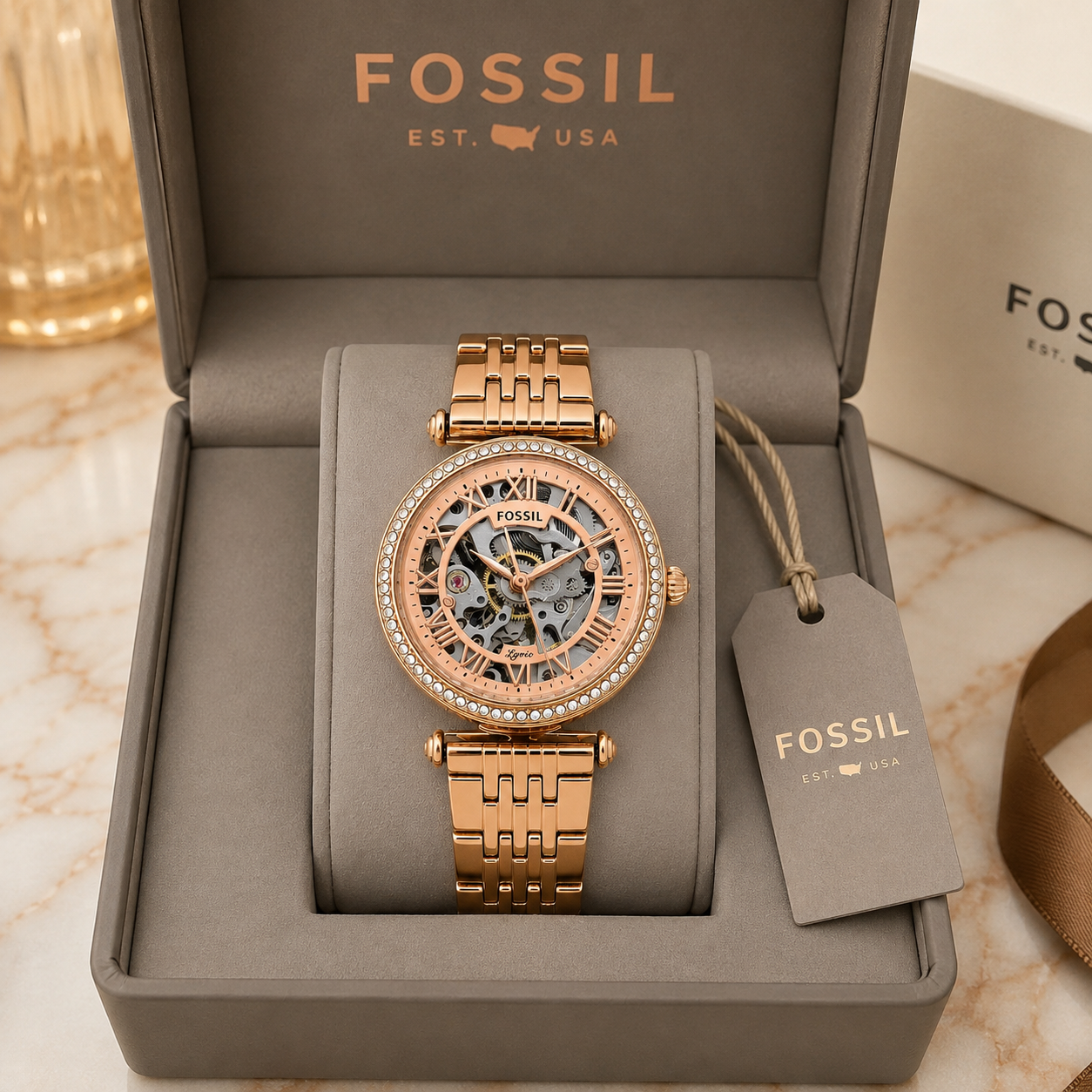 Fos_sil Lyric Women’s Rose Gold Automatic Skeleton Watch – Crystal Bezel & Stainless Steel Bracelet